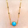Ketting met plaatjes en howliet